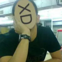 A photo of the author where the face has been replaced with an xD smiley